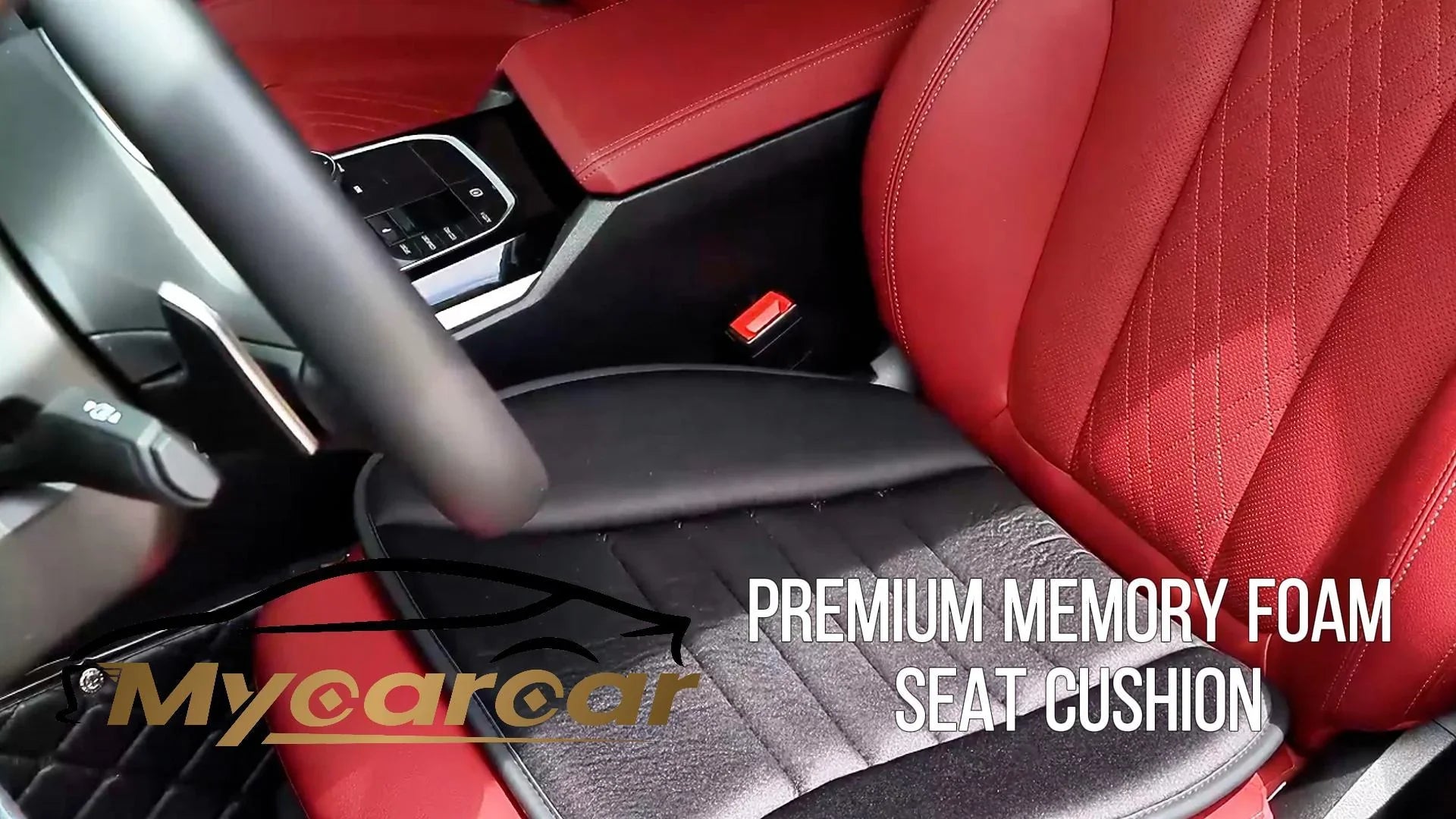 Black premium memory foam seat cushion on red leather car seat interior